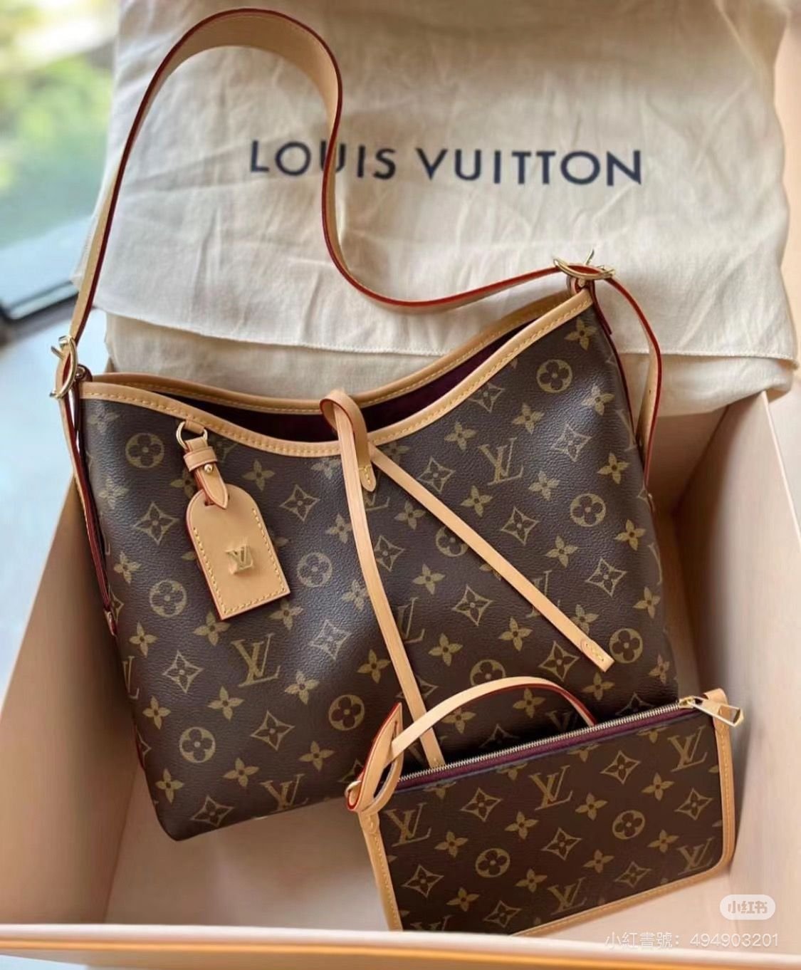 Louis Vuitton carryall mm bag
